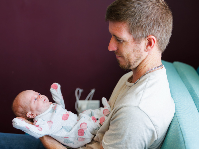 Tyler Meyers holds daughter Allie Ray just before she was discharged from neonatal intensive care. Melanie Thortis/ UMMC Communications 