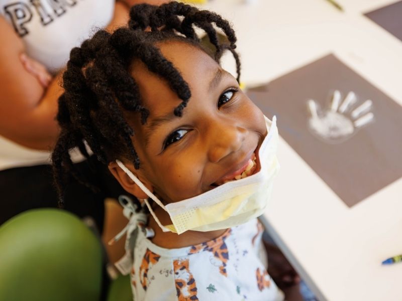 Children's of Mississippi patient Termondtrez Simmons smiles while working on a bone-related art project at Rainbow Academy.