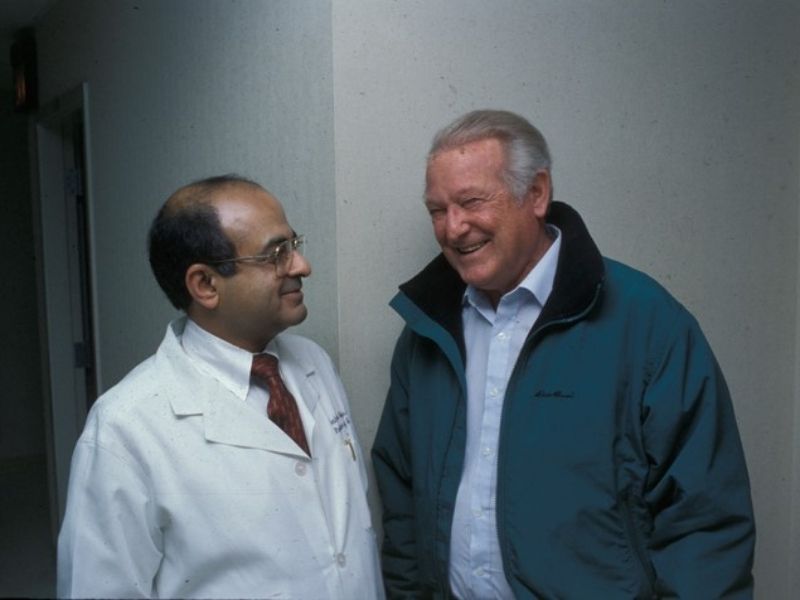 In this file photo, Dr. Seshadri Raju has a happy conversation with his most famous patient: U.S. Rep. Floyd Spence, the recipient of a double-lung transplant by Raju's hand.