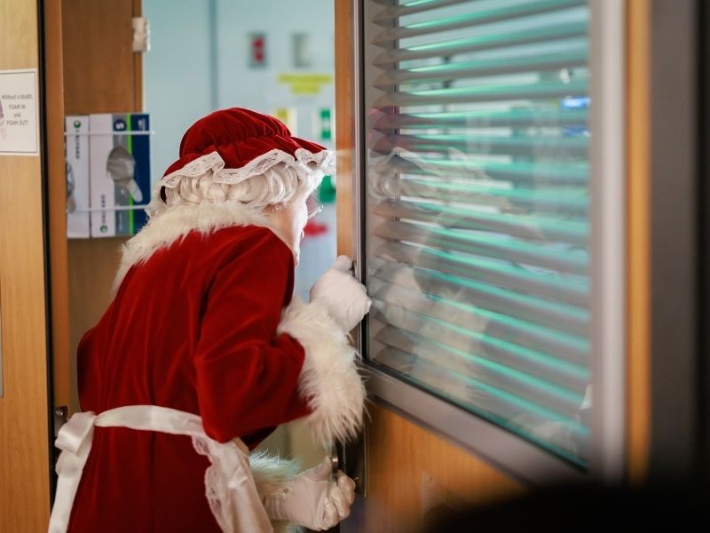 Mrs. Claus stops by to see a patient in Children's of Mississippi's neonatal intensive care unit.