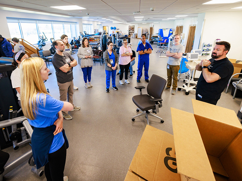 Director of Colony Park Operations Bryan Burnside, right, thanks Physical Therapy staff for their efforts to prepare the clinic for its upcoming opening at Colony Park South.