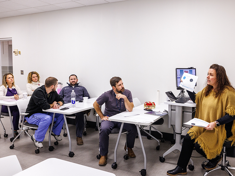  Ashley Darby, director of imaging services in radiology, meets with members of her work unit, including Troy Webb, interim manager in Children's imaging, Joshua Oubre, manager of interventional radiology, Abby Street, executive director of health system clinical operations and Elizabeth Greer, lead technologist in interventional radiology.