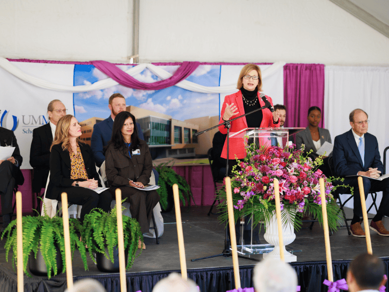 Dr. LouAnn Woodward, vice chancellor of health affairs, speaks at the School of Dentistry groundbreaking event for its new clinical building.