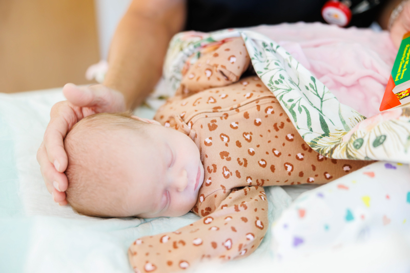 Children's of Mississippi patient Bailey Engram of Noxapater sleeps after a story during the Babies with Books Read-a-thon.