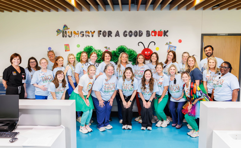 Members of the NICU care team at the Kathy and Joe Sanderson Tower show their spirit during the first day of the NICU's read-a-thon.