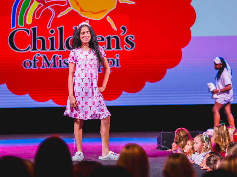 Katie Guilfoyle models a holiday nightgown and slippers.