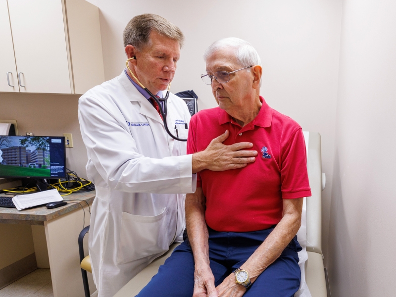 Dr. Michael McMullan examines Stewart during a routine check-up.