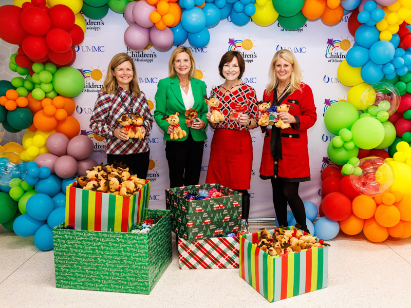Jennifer Hospodor, Senior Director of Strategic Partnerships; First Lady Elee Reeves; Dr. Mary Taylor, CEO of Children's of Mississippi and Meredith Aldridge, Executive Director of Development pose with toy donations brought to Children's of Mississippi.