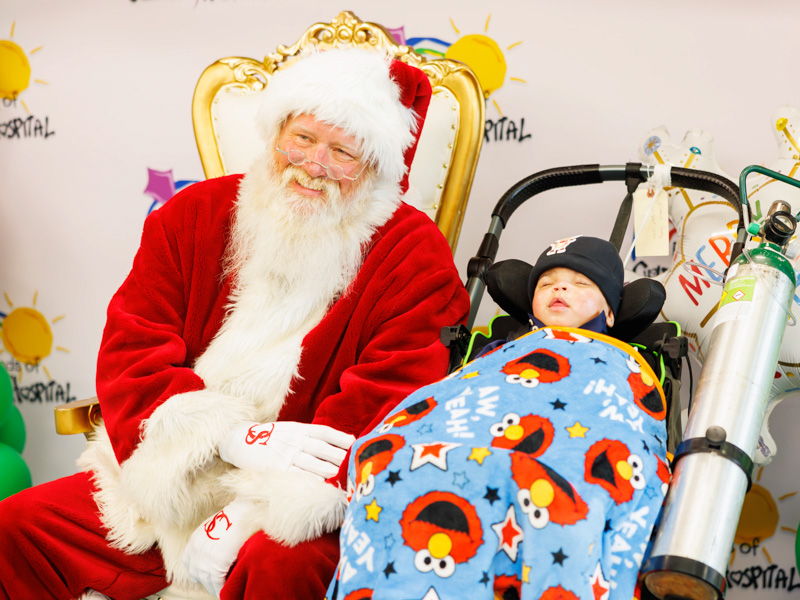Africa Wilson, 1, of Leland, meets Santa Claus at Santa's Workshop. Melanie Thortis/ UMMC Communications