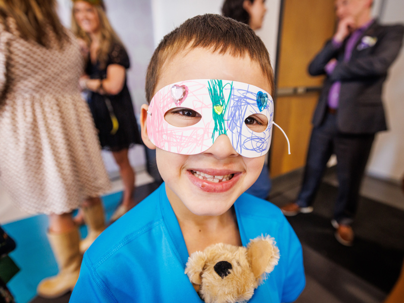 Memphis Gregory, 6, of West Monroe shows off his mask decorated at the Children's of Mississippi Mardi Gras parade. Jay Ferchaud/ UMMC Communications