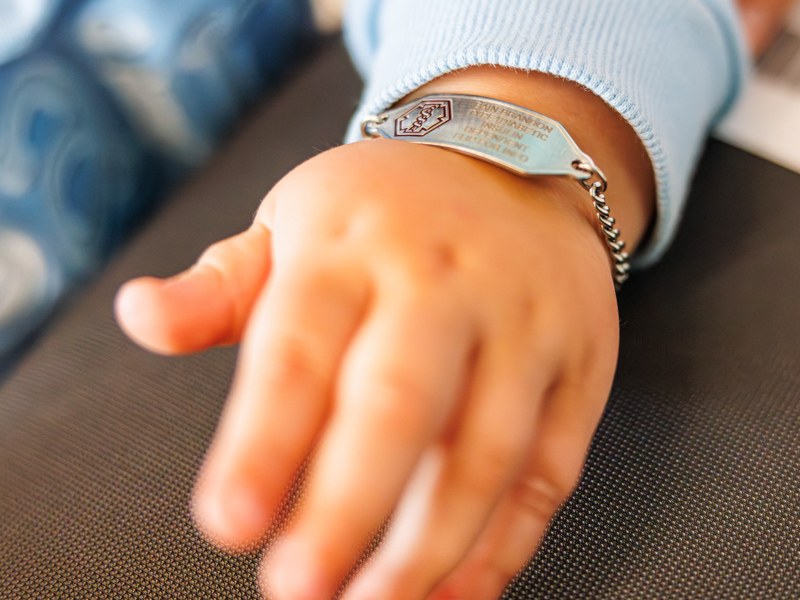 Brandon, 2, shows off his medical ID bracelet highlighting that he has type one diabetes.
