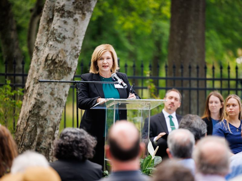 Dr. LouAnn Woodward, vice chancellor for health affairs and dean of the School of Medicine at the University of Mississippi Medical Center, tells families that their loved ones were teachers who continue to shape future health care professionals.