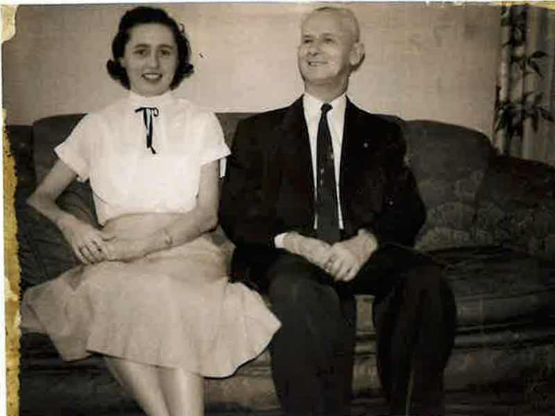 A young Catherine Powell sits with her father, Walter Frith Powell.