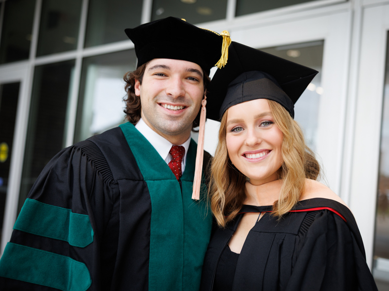 Husband and wife graduate Michael (PhD) and Kaitlin Franks (MSN) celebrate their joint accomplishments.