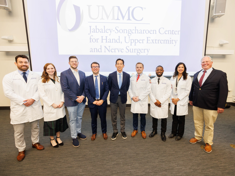 UMMC physicians pose with the first visiting professor of the series, from left, Dr. Michael Vollant, hand surgery fellow; Dr. Katie Brown,hand surgery fellow; Dr. Colton Fernstrum, plastic surgery resident; Dr. Marc Walker, Songcharoen Endowed Chair of Plastic and Reconstructive Hand Surgery; Dr. James Chang, the Johnson & Johnson Distinguished Professor and chief of plastic and reconstructive surgery at Stanford University, Dr. Steele Liles, orthopaedic surgery resident; Dr. AJ Forrest, orthopaedic surgery resident; Dr. Shireen Dogar, hand surgery fellow; and Dr. Mark Dodson, director of orthopaedic hand surgery.