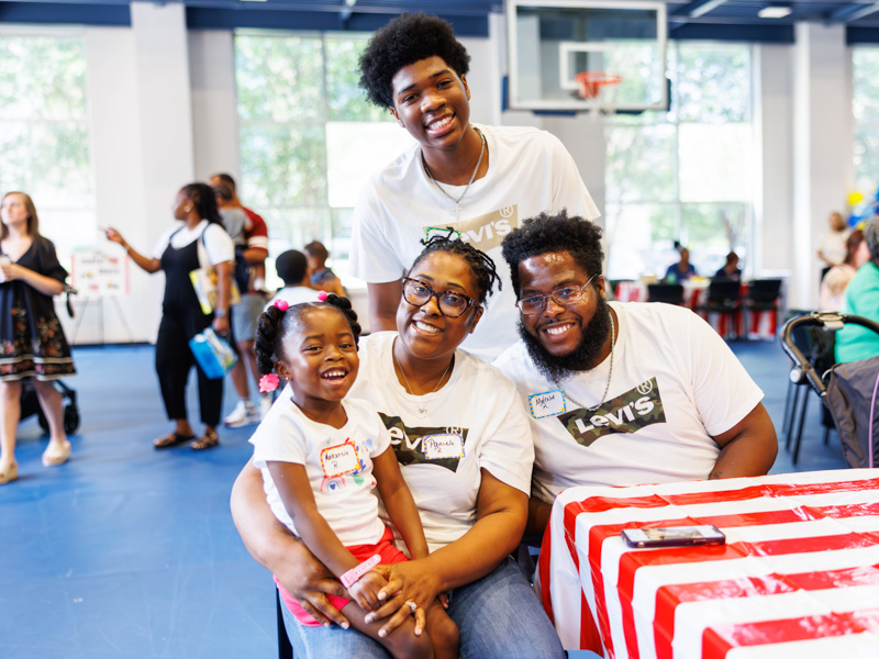 Makenzie Rucker ,3, celebrates NICU reunion day with her parents, Pam and Malcolm Rucker, and brother, Tylen Jones. Makenzie spent two months in the NICU at the children’s hospital.