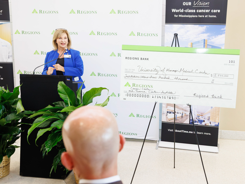 Dr. LouAnn Woodward, vice chancellor for health affairs, thanks Regions for their gift, which will help build a new home for the UMMC Cancer Center and Research Institute.