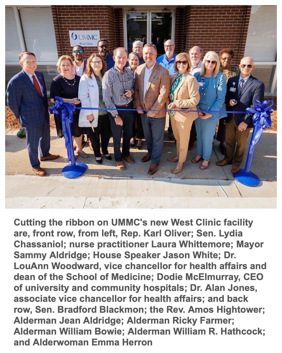 Cutting the ribbon on UMMC's new West Clinic facility are, front row, from left, Rep. Karl Oliver; Sen. Lydia Chassaniol; nurse practitioner Laura Whittemore; Mayor Sammy Aldridge; House Speaker Jason White; Dr. LouAnn Woodward, vice chancellor for health affairs and dean of the School of Medicine; Dodie McElmurray, CEO of university and community hospitals; Dr. Alan Jones, associate vice chancellor for health affairs; and back row, Sen. Bradford Blackmon; the Rev. Amos Hightower; Alderman Jean Aldridge; Alderman Ricky Farmer; Alderman William Bowie; Alderman William R. Hathcock; and Alderwoman Emma Herron