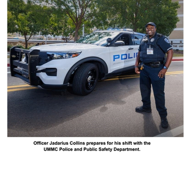 Officer Jadarius Collins prepares for his shift with the UMMC Police and Public Safety Department.