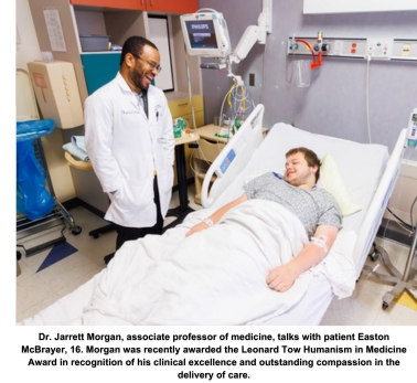 Dr. Jarrett Morgan, associate professor of medicine, talks with patient Easton McBrayer, 16. Morgan was recently awarded the Leonard Tow Humanism in Medicine Award in recognition of his clinical excellence and outstanding compassion in the delivery of care.