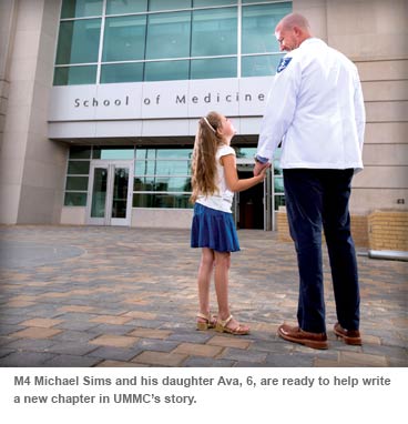 M4 Michael Sims and his daughter Ava, 61 are ready to help write a new chapter in UMMC's story.