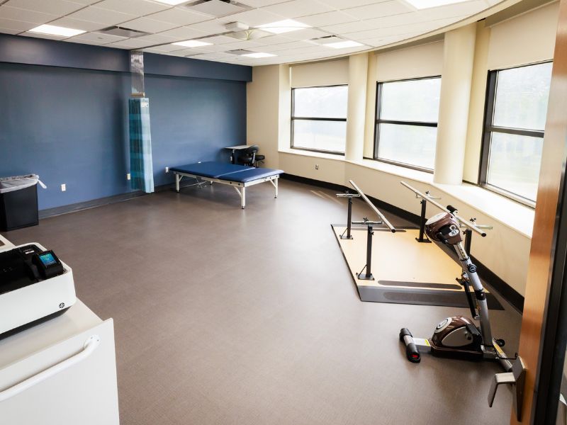 The Burn Center's gym with exercise mat and therapy equipment.
