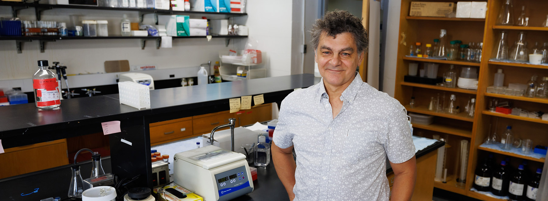 Dr. Drazen Raucher standing in a laboratory.