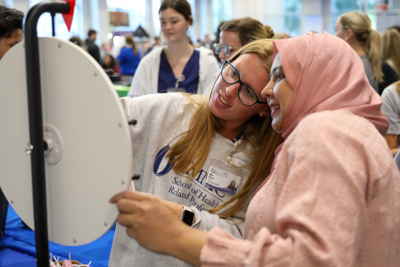 Students test their knowledge of population health at the ABS Block Party