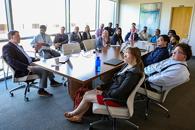 Dr. Les Herrington addresses students at the School of Population Health