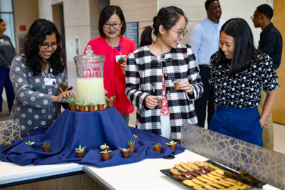 Student enjoy lemonade and cookies at the Succulent Soirée