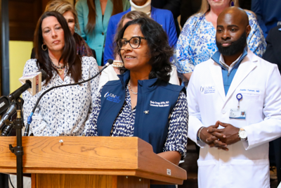 Dr. Manju George speaks at the Mississippi State Capitol, leading a press conference in recognition of Colorectal Cancer Awareness Month
