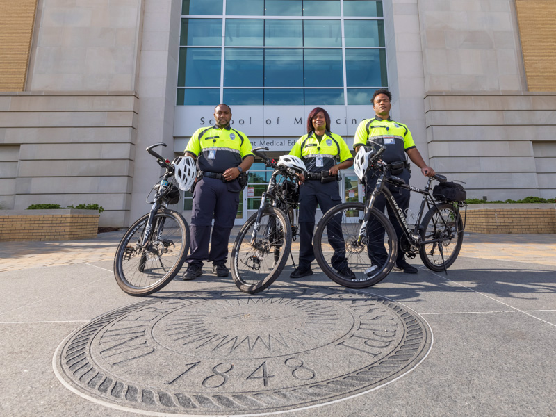Police officers with bicycles