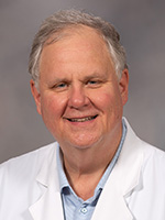 George W. May, DMD