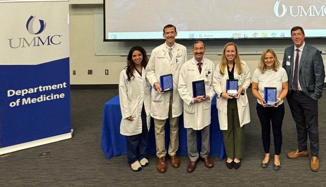 From left are Dr. Seema McKenzie, Department of Medicine Awards Committee member; Dr. Calvin Thigpen; Dr. Neville Dossabhoy; Dr. Carter Milner; Dimitra Kefalogianni and Dr. Michael Hall, department chair.
