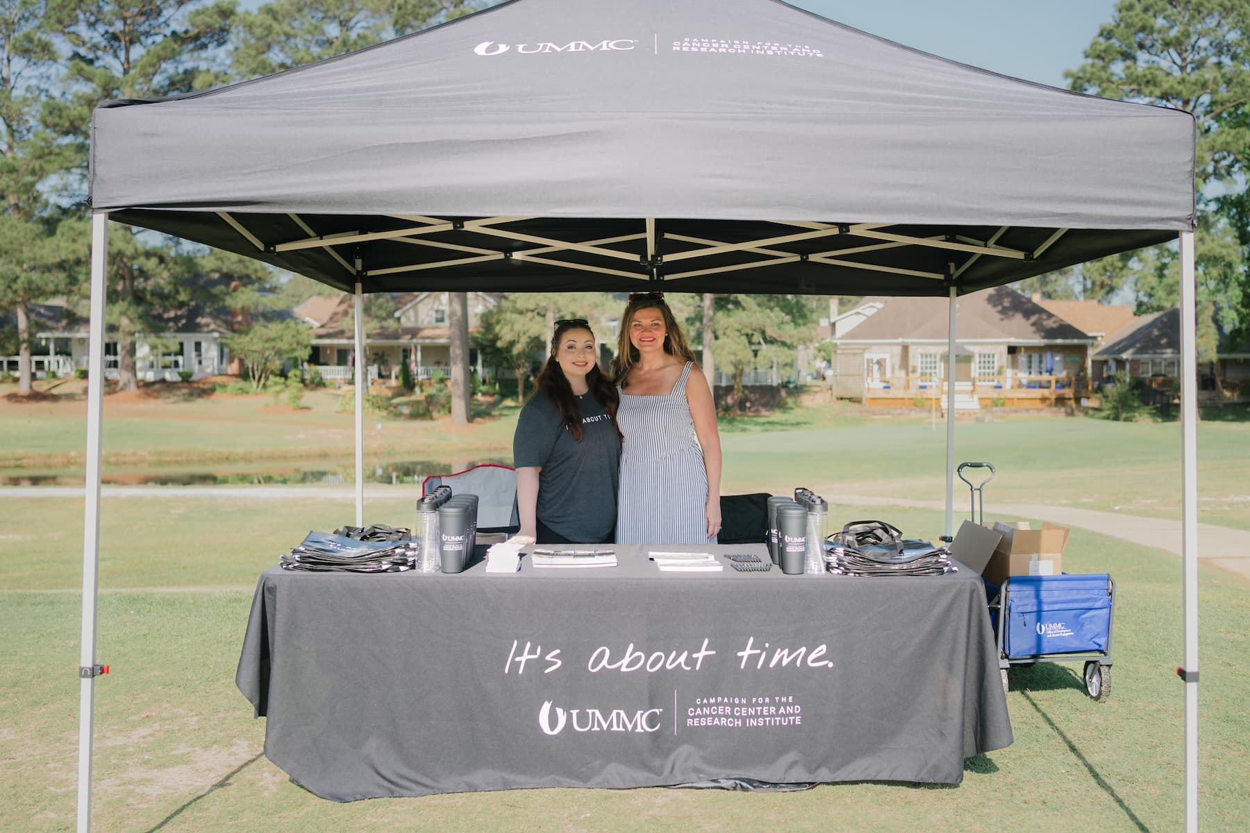 Erin Kiker and Suzanne Thigpen represent the UMMC Office of Development and Alumni Engagement represent the It's About Time campaign at the Magnolia Charitable Foundation Golf Tournament.