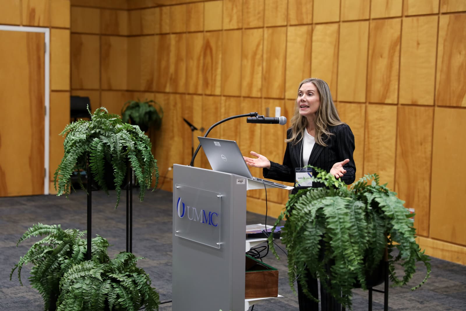 Dr. Caroline Compretta speaks during UMMC's Moving the Needle conference.