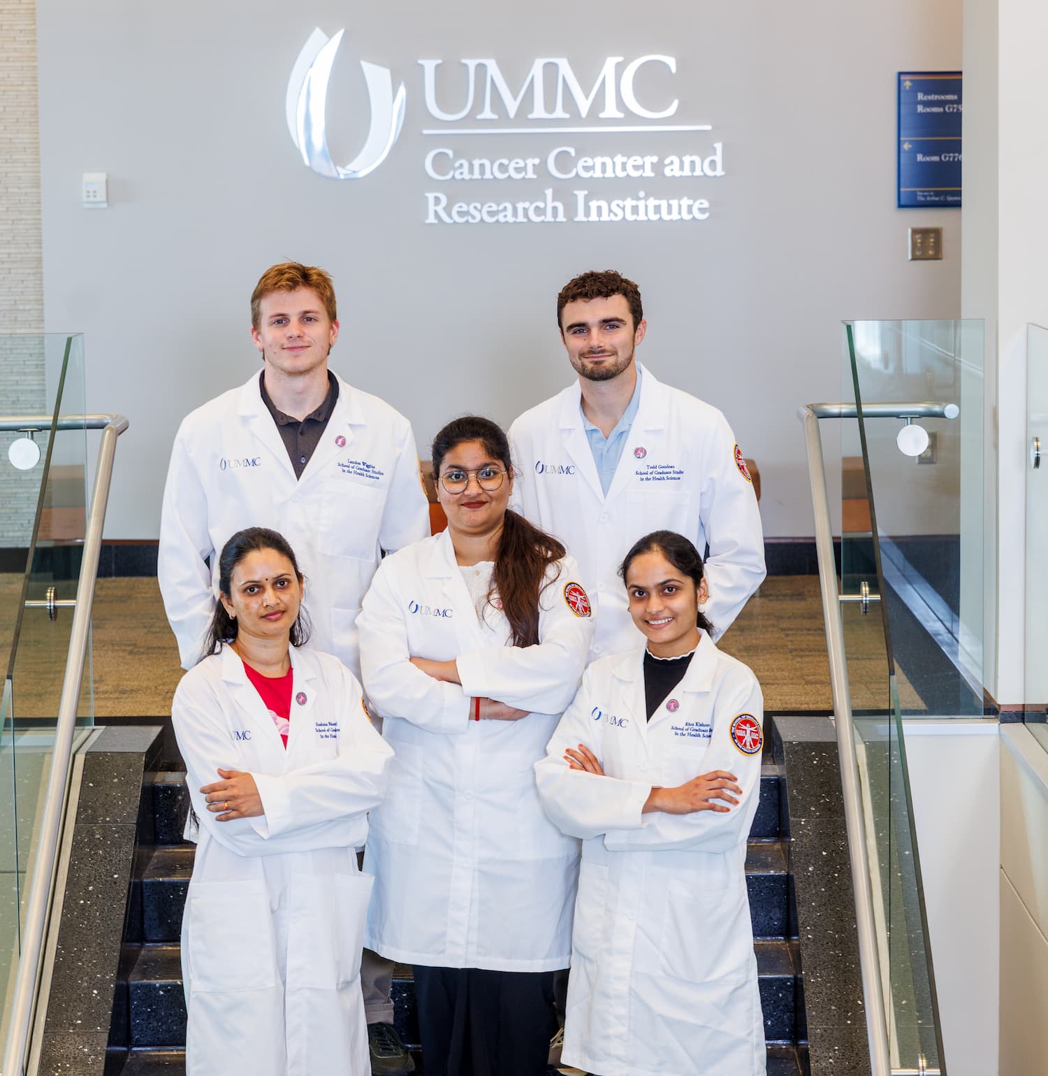 Cancer biology and therapeutics students include, back, from left, Landon Wiggins and Todd Goudeau; and front, Sushma Bhavani Pulipati, Tanvi Thakur and Rhea Kishore.and