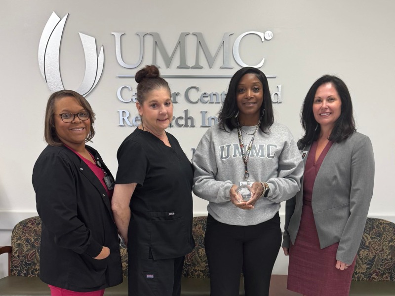 Congratulating Rededra  Smith, third from left, are, from left, Sheila Clincy, nurse manager, Denise Ogden, surgical specialty RN coordinator, and Heather Sistrunk, CCRI administrative director of clinical affairs.