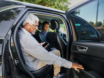 A patient takes advantage of Uber Health by getting a ride to his appointment.