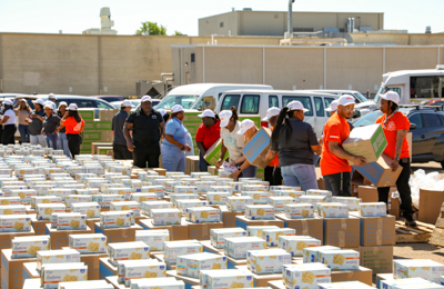 Preparing for distribution at the Feed the Children Resource Rally