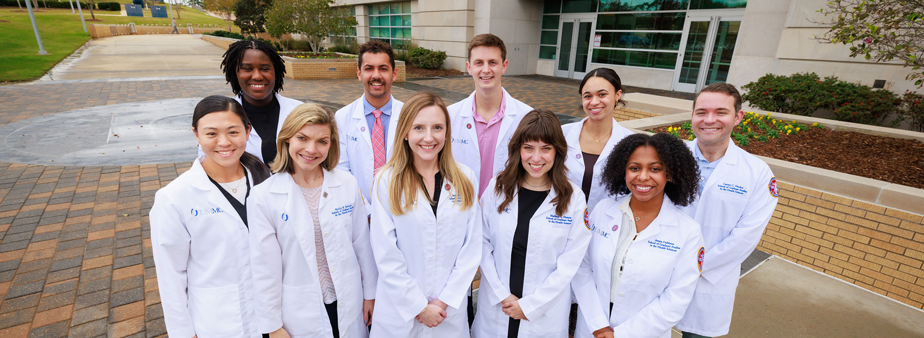 Outdoor group picture of 10 MD-PhD students.