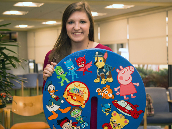 Ashlee Weaver, a third-year nursing student, chose to decorate her board with characters from popular children's television shows.