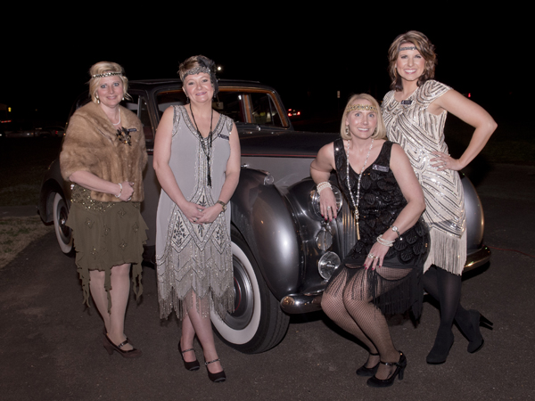 (From left) Heather Griffith, Shana Cook, Vickie Skinner and Kelly Dennis pose in front of a vintage Rolls-Royce.