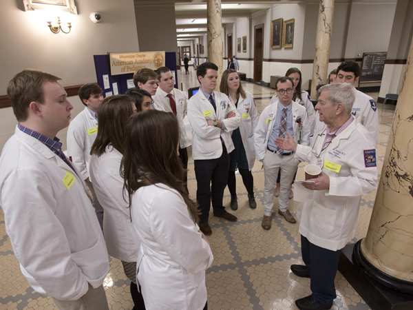 Feldman talks with medical students, residents and fellows at the start of Capitol Day.