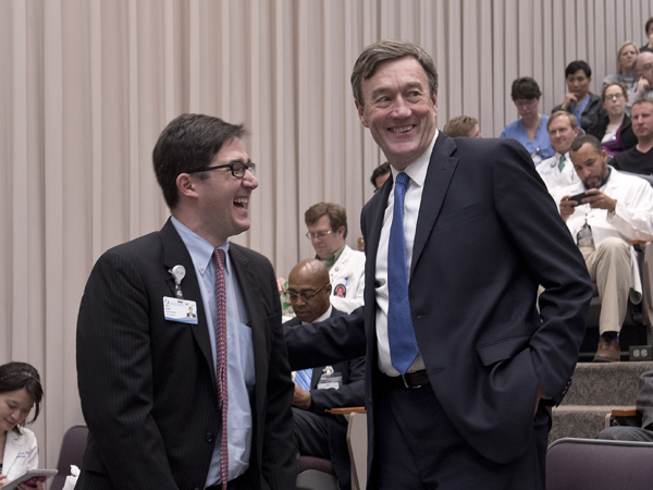 Noseworthy (right) shares a laugh with Dr. Peter Arnold, associate professor of plastic surgery.