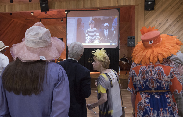 Watching the Kentucky Derby live on a big-screen television was a highlight of the University Transplant Guild's "Day at the Derby" fundraiser.