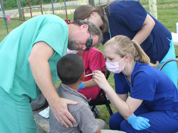 Dentistry, dental hygiene students create smiles in Belize
