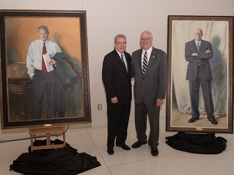 Portraits unveiled for two big-picture leaders