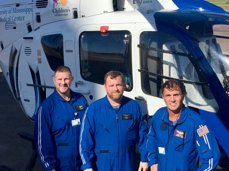 Staff members for AirCare 4 in Greenwood include, from left, registered nurse Kevin King, critical care paramedic Jack Hourguettes and pilot Keith Bailey.