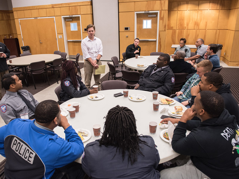 Associated Student Body President Will Thomas, center, welcomes campus police officers and staff to an appreciation luncheon sponsored Tuesday by the ASB.
